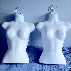 Display items. Hanging or free standing female torso mannequins.